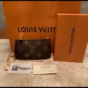 Brand new Louis Vuitton Monogram Key Pouch Cles